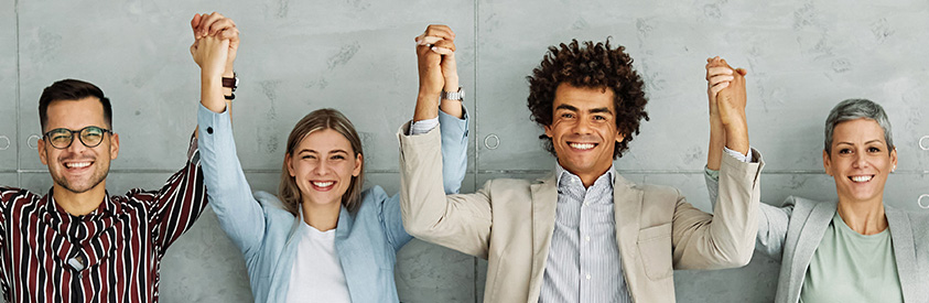coworkers holding hands